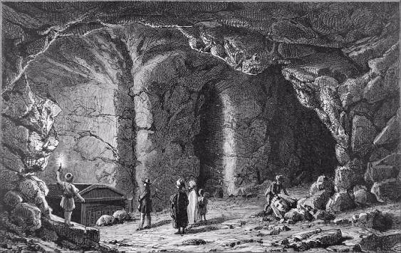 Nineteenth-century engraving of the interior of the Serapeum of Saqqara during Mariette's 1851 excavation, showing explorers with torches in the vault